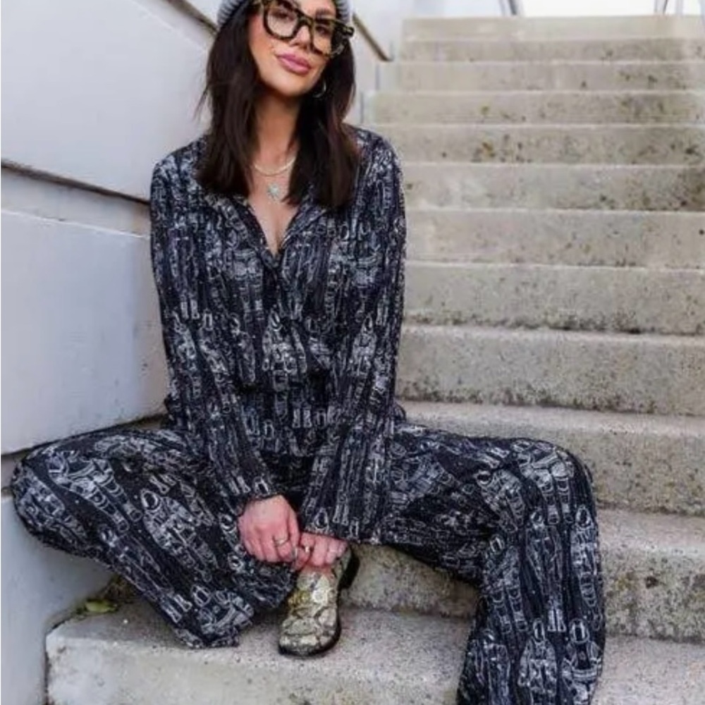 Small Black and White  astronaut Patterned Shirt long sleeve. Dressed in lala